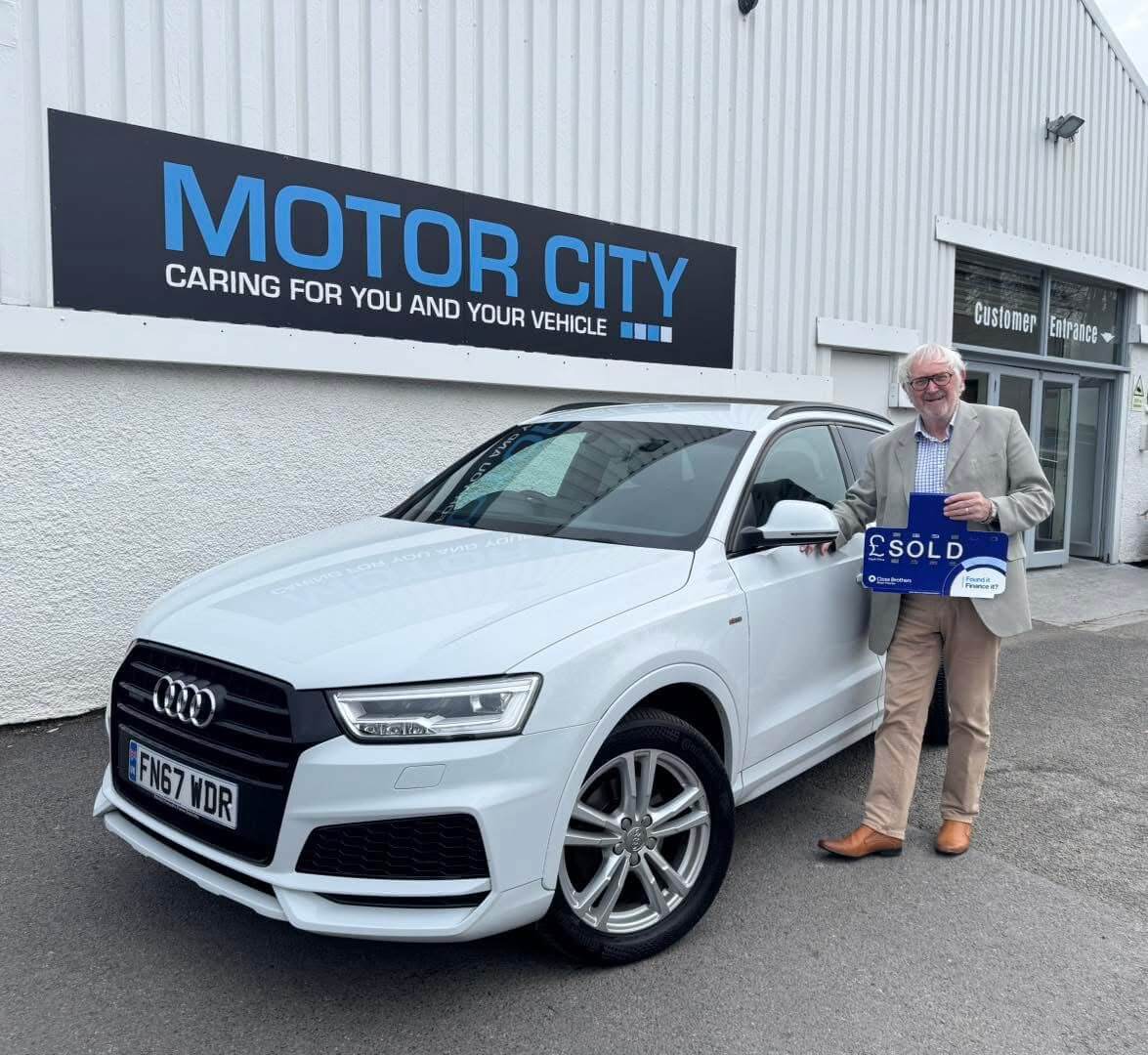 Another happy Motor City Plymouth customer