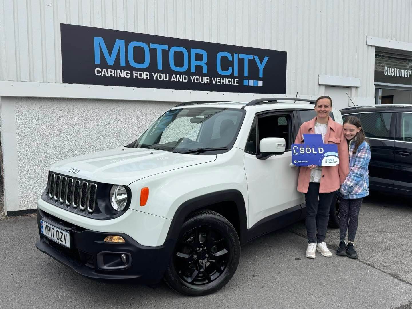 Another happy Motor City Plymouth customer