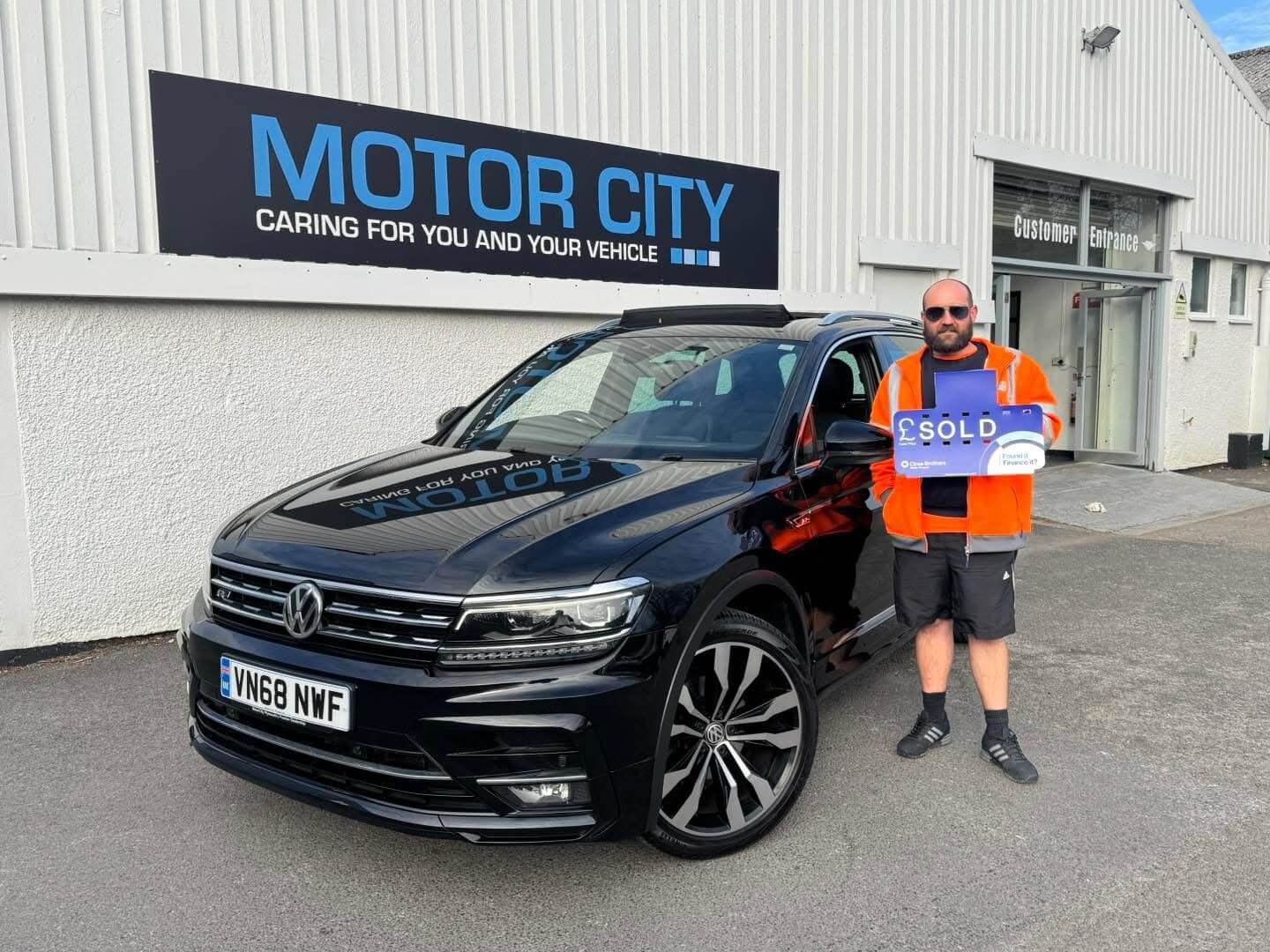 Another happy Motor City Plymouth customer