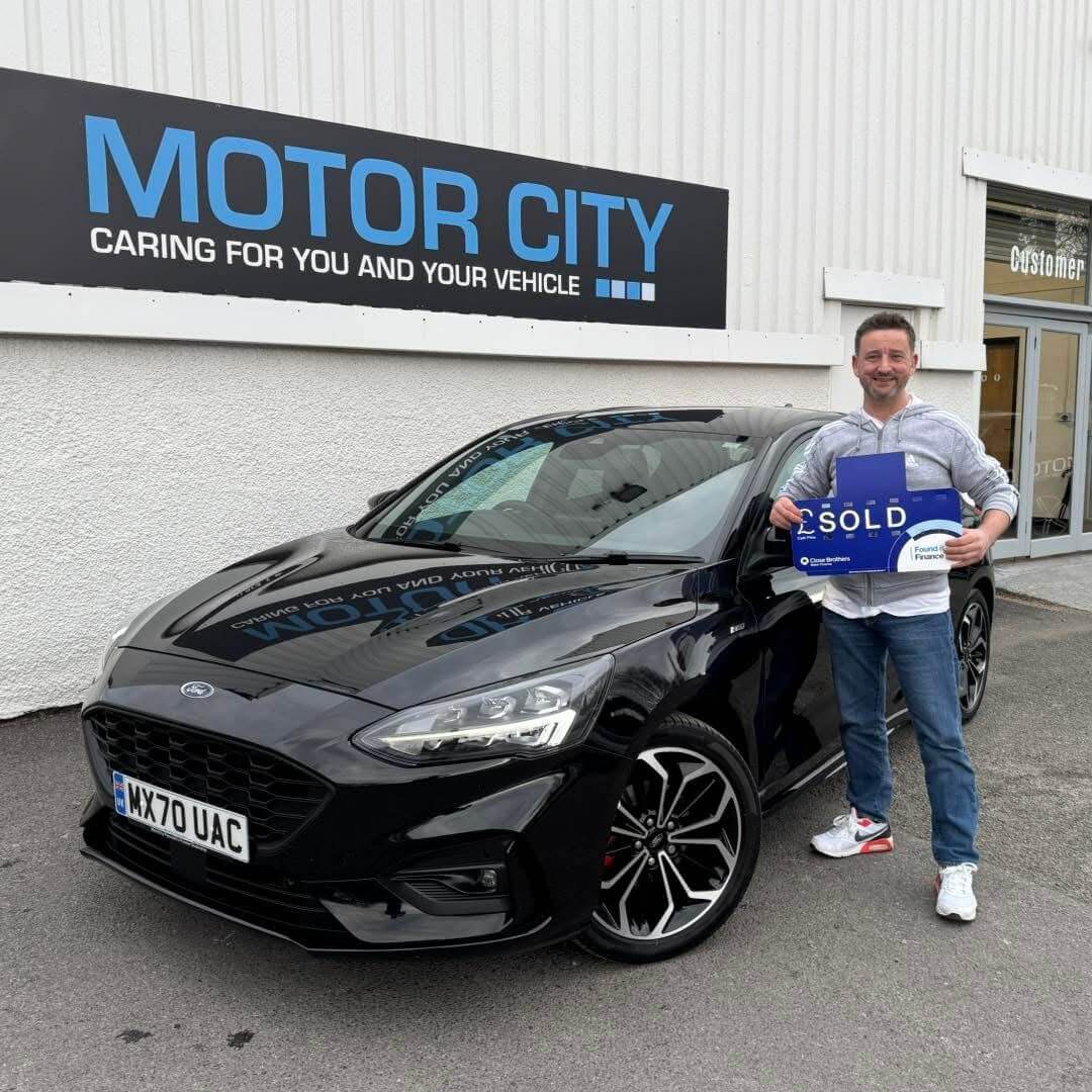 Another happy Motor City Plymouth customer
