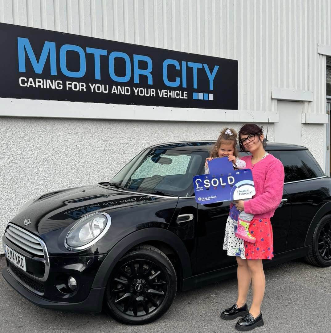 Another happy Motor City Plymouth customer