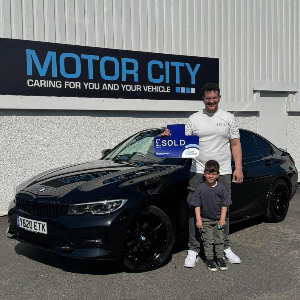 Another happy Motor City Plymouth customer